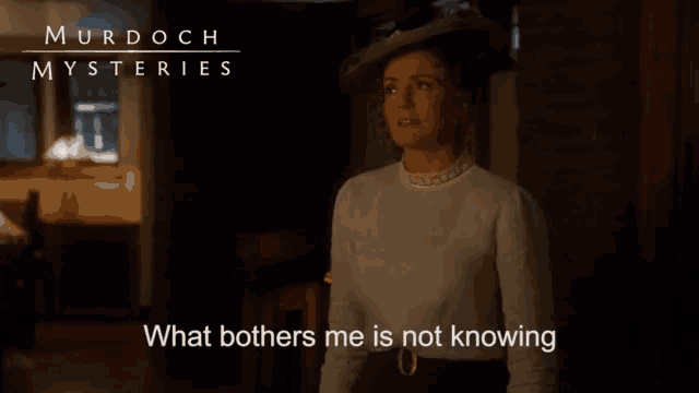 murdoch mysteries shows a woman in a white dress