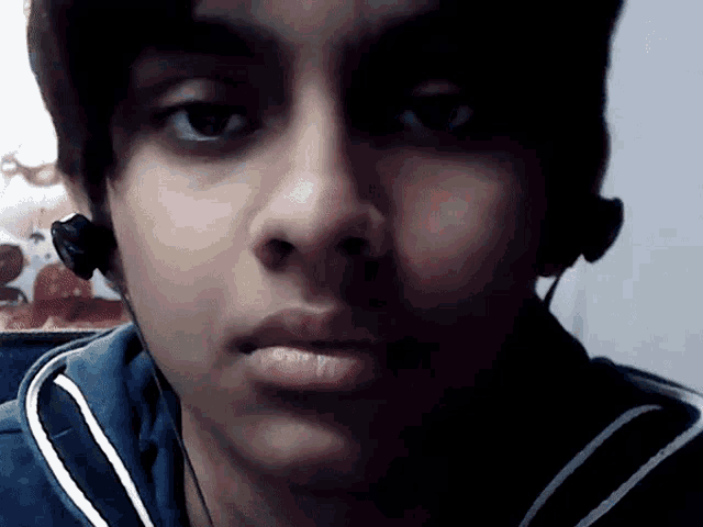 a close up of a person wearing headphones