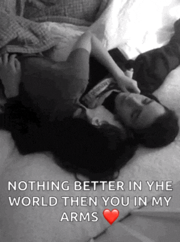 a black and white photo of a man and woman hugging with the caption nothing better in the world then you in my arms with a red heart