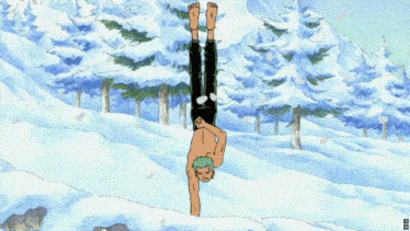 a man is doing a handstand in the snow