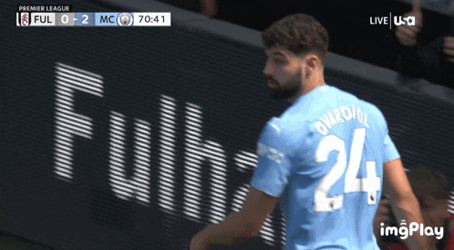 a soccer player with the number 24 on his back