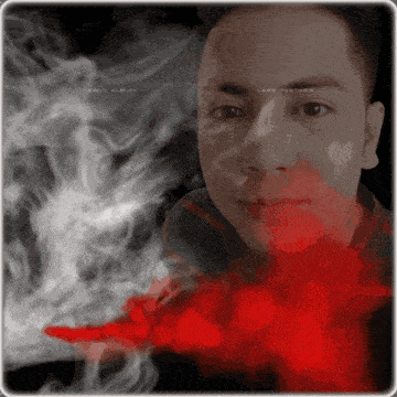 a man 's face is surrounded by smoke and says debut album on the bottom