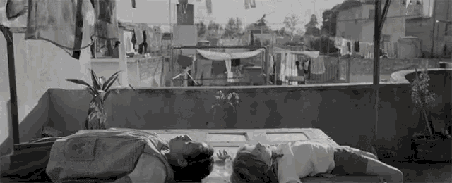 Roma Lying Down GIF - Roma Lying Down Drying Clothes GIFs