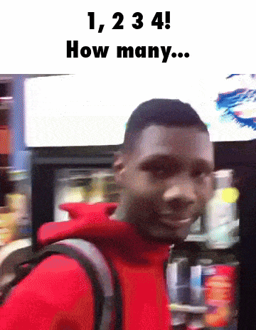 a man in a red jacket is standing in front of a vending machine with the words 1,234 how many written above him
