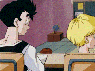 a boy and a girl are sitting in a classroom with a globe on the floor