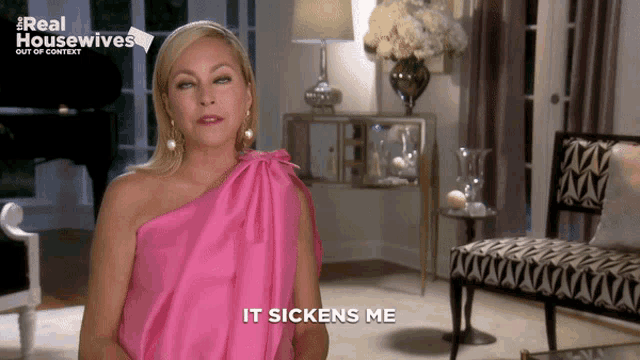a woman in a pink dress says it sickens me in front of a sign that says real housewives