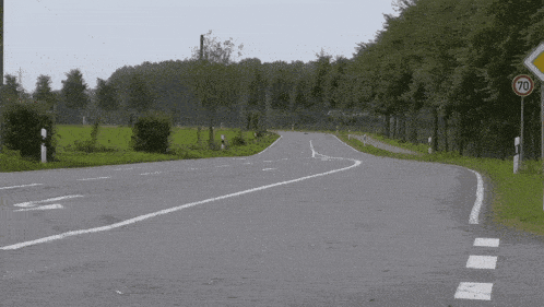 a sign on the side of a road says 70