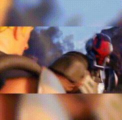 a close up of a person wearing a helmet and sunglasses