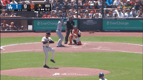 a baseball game is being played between the giants and the brewers