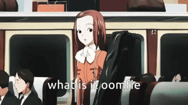 a girl on a train with the words what is it oomfie