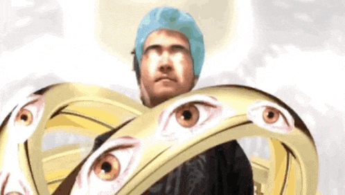 a man in a surgical cap is surrounded by rings with eyes on them .