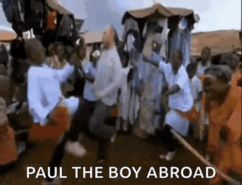 a group of people are dancing in front of a sign that says paul the boy abroad ..
