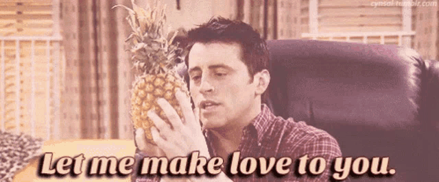 a man is holding a pineapple and saying let me make love to you
