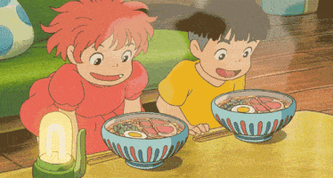 a boy and a girl are looking at bowls of food