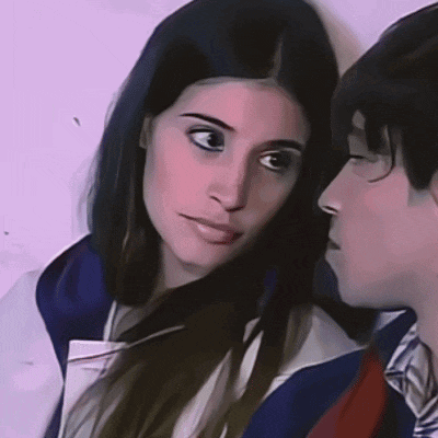 a man and a woman are looking at each other with a purple background