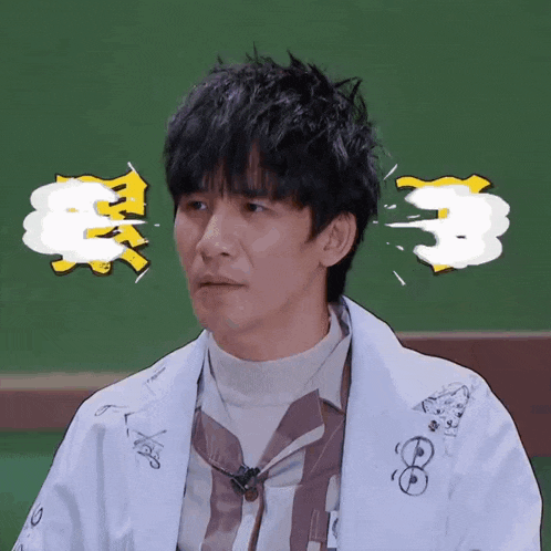a man wearing a white coat with a sticker on it that says ' a ' on it