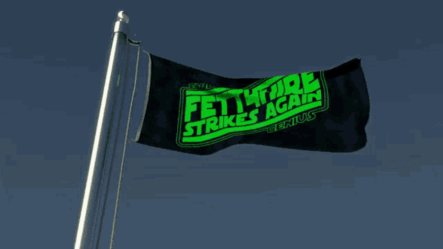 a black and green flag with fett hire strikes again written on it