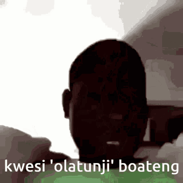 a silhouette of a man with the words kwesi ' olatunji ' boateng above him