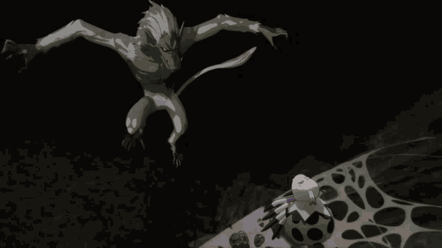 a blurred image of a white object on a black surface