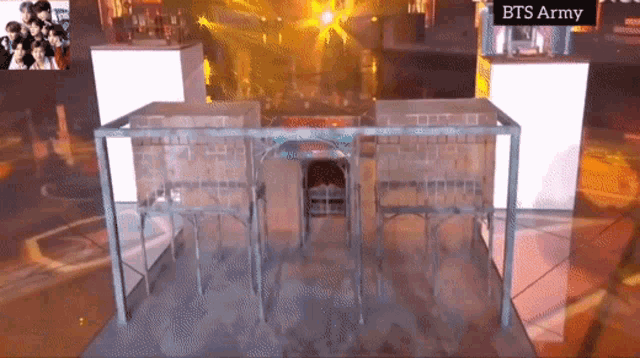 a bts army advertisement is displayed on a stage