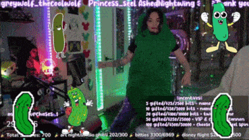 a girl in a pickle costume is dancing on a screen