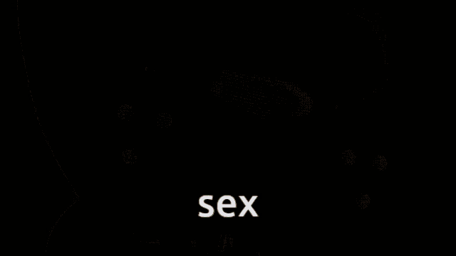 a stuffed animal with its mouth open and the word sex in its mouth