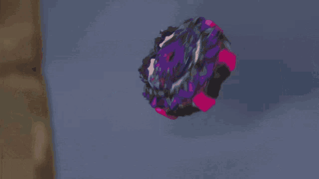 a cartoon character with purple hair has a fist up