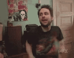 a man wearing a black shirt with the fx logo on the bottom