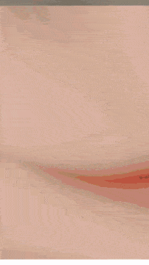 a close up of a person 's face with a blurred background