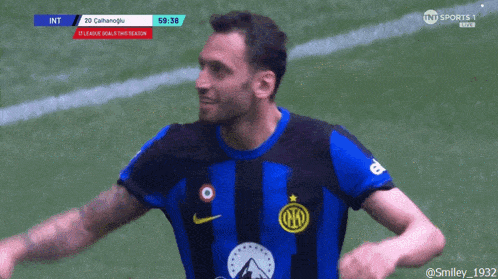 a soccer player celebrates a goal during a game on tn sports 1