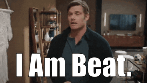 a man says i am beat in front of a television