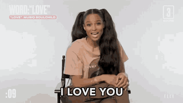 a woman sitting in a chair with the words i love you on the bottom