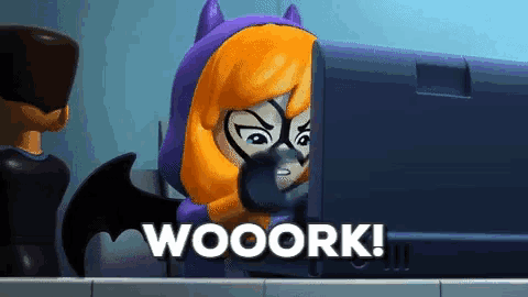 a cartoon character says wooork in front of a computer