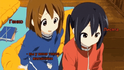 two anime girls are standing next to each other and one of them is wearing earphones