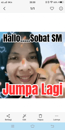a phone screen shows a picture of a woman and a child with the caption jumpa lagi
