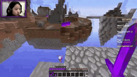 a girl playing a video game called skywars with a purple sword