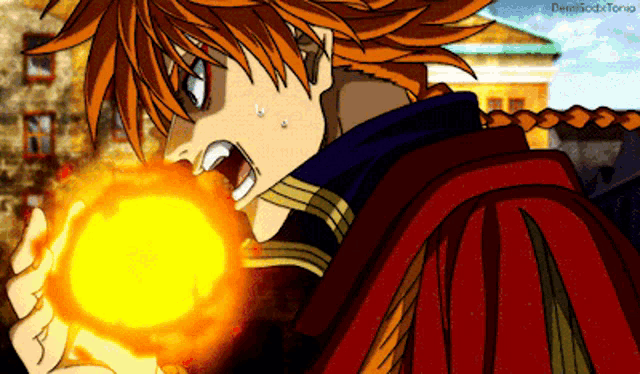 a person in a red cape is holding a ball of fire in their hands