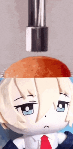 a stuffed doll with a sad look on his face is next to a large orange ball