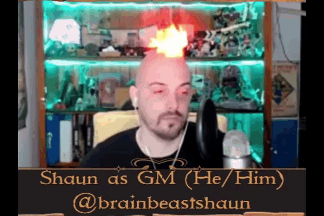 a man with a fireball on his head and the name shaun on it