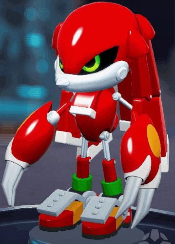 a red robot with green eyes is standing on a table