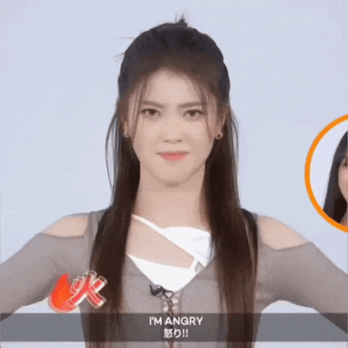 a girl with long hair says i 'm angry in a foreign language