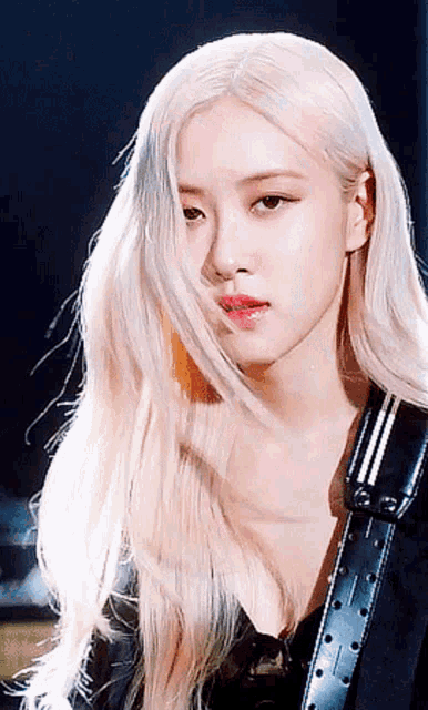 a close up of a woman with blonde hair