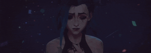 a man and a woman with blue hair are hugging each other in a dark room .