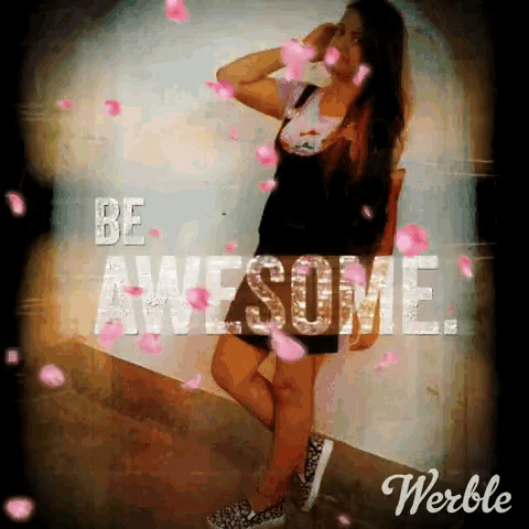 a woman is standing in front of a wall with the words " be awesome " on it