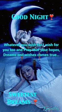 a woman is laying in bed with a dog and the words good night