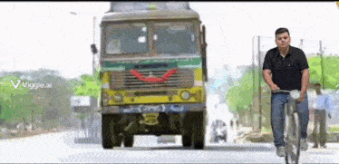 a man is riding a bike in front of a truck