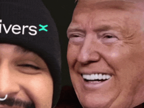 a man wearing a beanie that says ivers x smiles