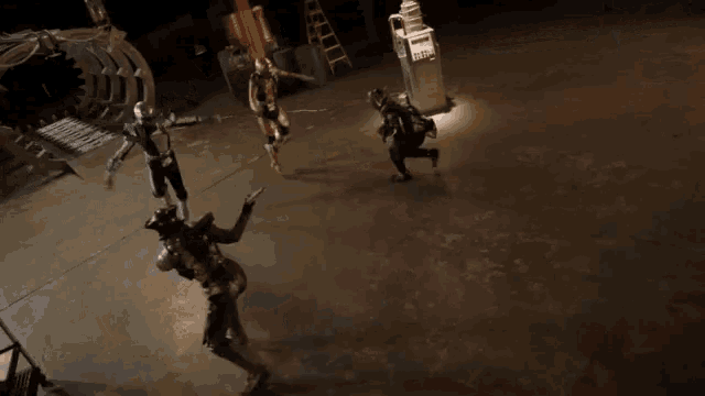 a statue in a dark room has a sticker on it that says ' a '