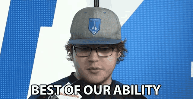 a man wearing glasses and a hat with the words best of our ability above him