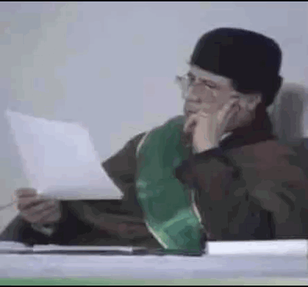 Gaddafi Libya GIF - Gaddafi Libya Paper GIFs